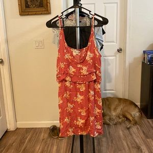 Coral floral mini dress with ruffle detail at waist